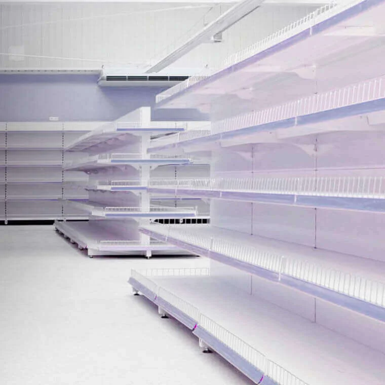 bare white retail shelves